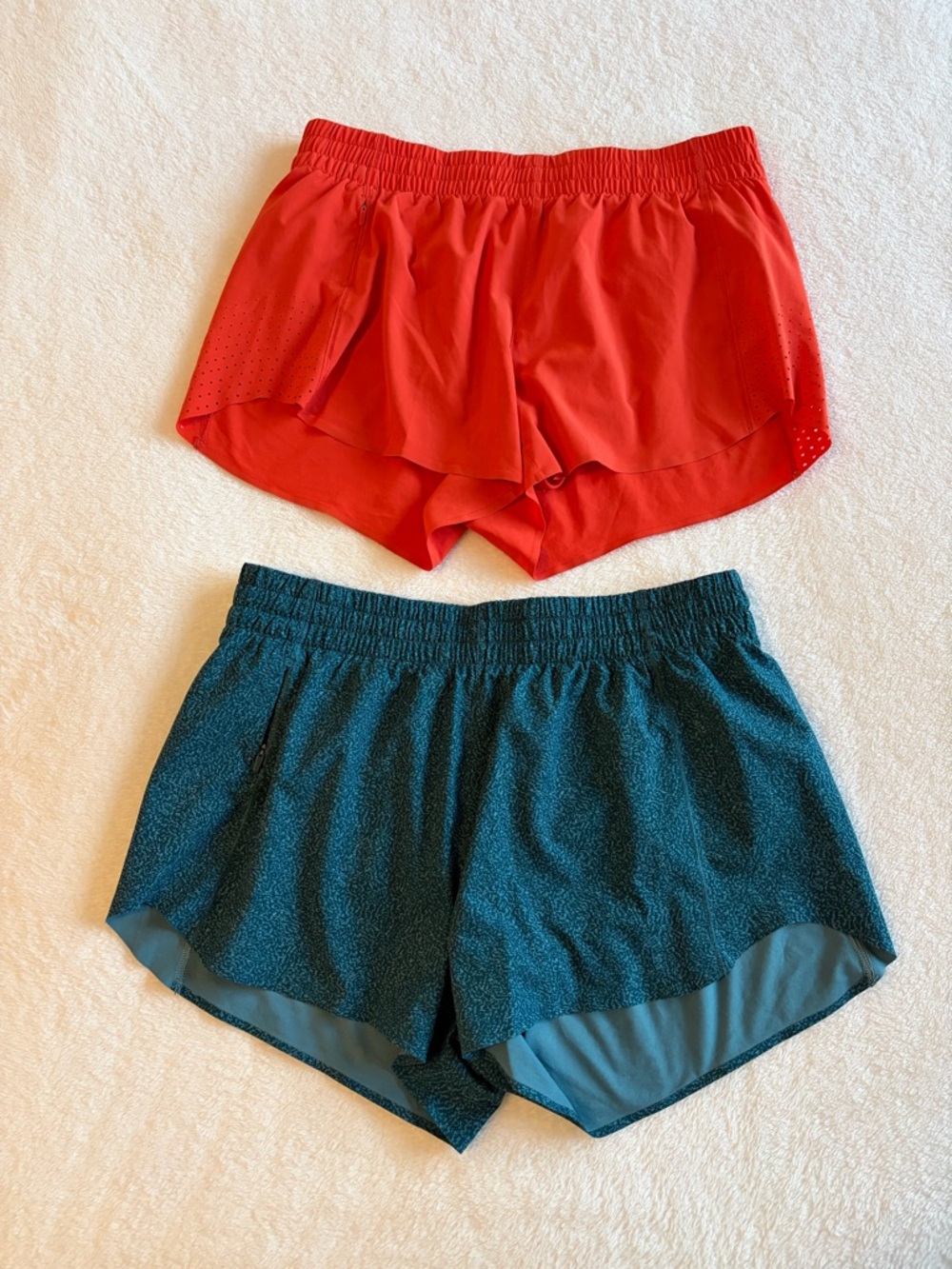 2 pairs of Athleta 3 inch hustle run shorts